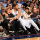 JaVale McGee, No. 34, then playing with the Denver Nuggets, ends up in the front row after saving the ball against the New Orleans Pelicans at Pepsi Center in Denver on Nov. 21, 2014. (Doug Pensinger/Getty Images)